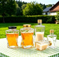 Bocaux en verre torsadés uniques de 350 ml (12 oz) vides pour miel avec couvercle métallique
