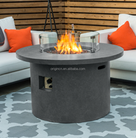 Table de foyer extérieure ronde en métal de luxe contemporaine à gaz naturel pour usage hôtelier