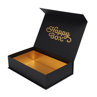 Boîte cadeau noire personnalisée en gros avec couvercle magnétique à charnière, intérieur doublé or et couvercle articulé pour emballage de vêtements ODM
