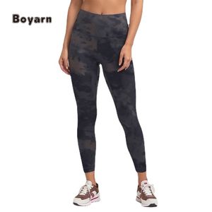 Leggings de yoga taille haute à neuf points pour femmes pantalons de sport élastiques à séchage rapide pour la course et le fitness Tie Dye Design - Product Image 1