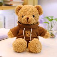 Ours en peluche mignon aux cheveux bouclés brun clair avec t-shirt rouge, personnalisable avec logo du fabricant