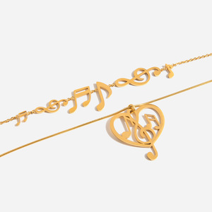 Collier pendentif ajouré en forme de note de musique en acier inoxydable plaqué or 18 carats unisexe pour tous les jours - Product Image 1