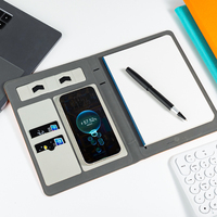 Carnet en cuir PU A5 rechargeable personnalisé batterie externe intégrée de 10000mah chargeur sans fil pour ordinateur portable de luxe