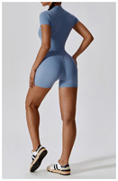 Vente en gros Vêtements de sport Barboteuse de yoga une pièce avec fermeture éclair Short de fitness à manches courtes Combinaison pour femmes
