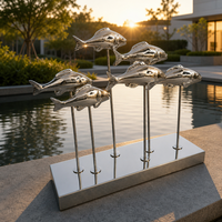 Escultura Metálica Moderna de Peces en Acero Inoxidable Pulido Espejo, Escultura Metálica Personalizada de Escuela de Peces para Jardín de Hotel y Paisajismo