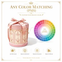 Boîte cadeau cylindrique rose exquise, fabriquée en carton rond luxueux, accompagnée d'un ruban pour la décoration.