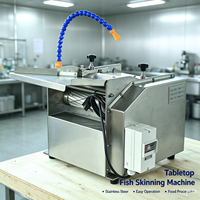 Machine à peler la peau de poisson de grande capacité, machine électrique à éplucher la peau de poisson pour les usines de produits de la mer