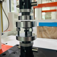 Máquina de prueba universal de doble columna 2KN Servo de computadora con resistencia de almohadilla de goma 220V 1 año de garantía
