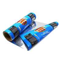 Rouleau de film d'emballage de croustilles imprimé personnalisé de qualité alimentaire pour biscuits et collations Rouleau de film de stratification Rouleau de film d'emballage de bonbons
