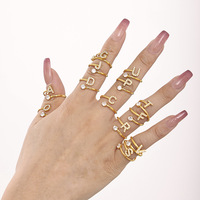 Collier, bracelet, boucles d'oreilles et bagues en acier inoxydable avec initiale en zircon, bijoux de mode en gros