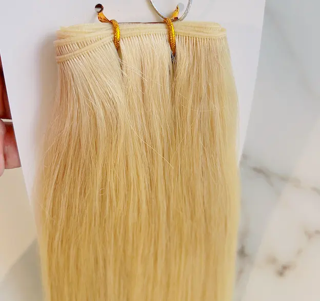 Popular unprocessed virgin hair vendor human hair weft 0.5mm thickness genius weft hair extension