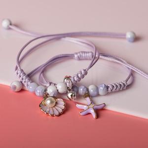 Bracelet ajustable fait main en alliage plaqué argent tressé avec breloques papillon, étoile de mer, coquillage et perle pour femmes et meilleures amies - Product Image 1
