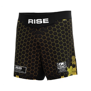 Shorts de MMA noirs dorés à coutures renforcées, séchage rapide, durables, avec fentes latérales, idéaux pour le BJJ sans équipement et le sparring - Product Image 1