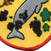 Patch brodé thermocollant sur le thème de la pollution de l'océan