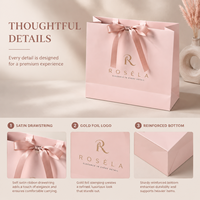 Sac de courses élégant et professionnel en papier blanc avec nœud, imprimé en héliogravure personnalisé pour les marques de vêtements de créateurs et les cadeaux de mariage
