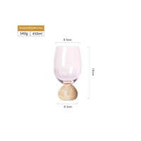 Verre à vin rouge transparent doré avec base en forme de coupelle à glace, idéal pour cocktails, restaurants, hôtels ou fêtes