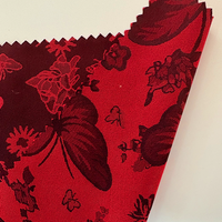 Le dernier tissu tissé floral de papillon rouge de tissu de jacquard de satin peut être employé pour la robe/robe somalienne de Dirac