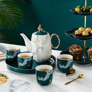 Juego de Tazas de Té de Cerámica con Diseño Rústico Rural de Hojas Verdes y Luna, 4 Tazas y 1 Tetera - Product Image 3