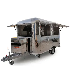 Airstream bus catering trailer, mobile kitchen camping caravan trailer, popcorn pizza fried food truck on the street