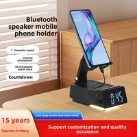 Support de téléphone portable de bureau stéréo trois-en-un pliable et réglable en hauteur avec haut-parleur d'alarme et microphone intégré alimenté par batterie