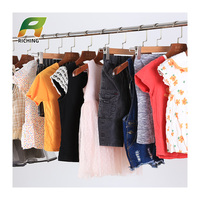 Fournisseur de Guangzhou Vente en gros Été Printemps Enfants Vêtements d'occasion Ballots de 45kg Conteneur Mélange de vêtements d'occasion