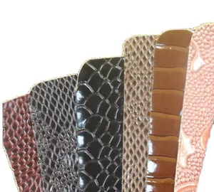 Cuero de PVC bordado en relieve de cuero impreso tela sintética utilizada para hacer Bolsos De Mujer sofás muebles asientos de coche