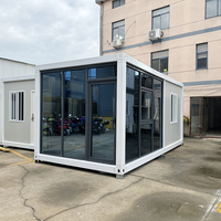 Vie moderne Maisons portables Villa préfabriquée intelligente en acier Chambre à coucher Mur rideau en verre Maison conteneur pour le logement