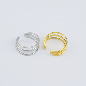 Nouvelle bague unisexe en acier inoxydable, design ajouré simple et original, plaquée or et argent, bijoux géométriques tendance en gros - Product Image 1