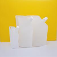 30ml 50ml 100ml pochettes en plastique thermoscellées avec logo personnalisé pochette à bec pour purée alimentaire réutilisable pour bébé