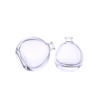 Bouteille de parfum en verre de luxe ronde 30ml 50ml 75ml pour vaporisateur en forme de boule avec noir pour bouchon à bille pour diffuseur et emballage