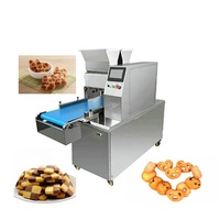 Machine à fabriquer des biscuits et des gâteaux entièrement automatique en acier inoxydable, double couleur, pour usage en boulangerie, neuve