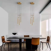 Lustre suspendu en tube LED en acier inoxydable personnalisé pour intérieur, grand design, style cristal, pour table à manger, hôtel, escalier