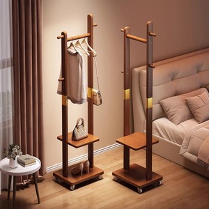 Space-saving floor-standing small solid wood coat <b>rack</b> for bedroom, a new style of room storage for <b>clothes</b> at night. - Product Image 1