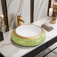 Lavabo d'armoire sanitaire de couleur d'or pour les éviers de comptoir en céramique ovale moderne blanc en vente de gros