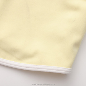 แห้งสบาย เคลื่อนไหวอิสระ: เสื้อกล้ามขนแกะเมอริโนพร้อมสายรัดกว้างที่กระชับ - Product Image 5