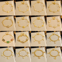 Bracelet à breloques en acier inoxydable pour femme, plaqué or, motifs assortis (cœur, fleur, nœud, étoile, papillon), vente en gros