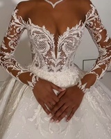 Offre Spéciale d'Afrique 2026 Robe de mariage de luxe en satin à manches longues et épaules dénudées Robe de bal avec appliques en dentelle perlée Robe de mariée