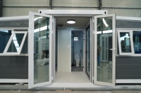 Maison conteneur pliable extensible de 10 pieds, maison préfabriquée portable de petite taille avec aménagement personnalisé
