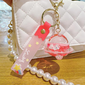 LLavero de animal acrílico aceitado de dibujos animados, platillo volador creativo, botella de arena movediza, llavero, bolsa, colgante, máquina de garra, llavero de regalo - Product Image 1