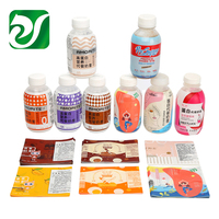 Étiquettes à manchon thermorétractable en PVC PET à impression personnalisée pour l'emballage de canettes de boisson de jus Film d'étiquette d'emballage rétractable pour bouteille