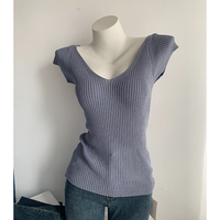 Nouveau style tempérament coupe ajustée col en V profond montrant la figure manches volantes mince à manches courtes pull tricoté T-shirt pour les femmes
