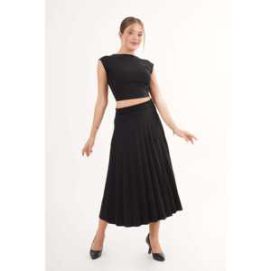 Falda midi plisada de cintura alta de cuero sintético negro para mujer, suave y elástica. - Product Image 1