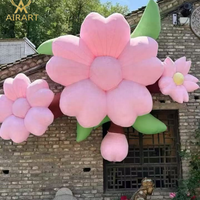Modèle de fleur géante entièrement gonflable avec des pétales volumineux pour la décoration de patio, de mur de bâtiment, de cour, de fête de mariage, fleur gonflable