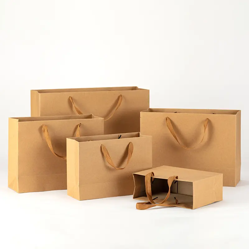 Dekunpackaging Design personnalisé Sac d'emballage cadeau en papier kraft en tissu avec logo pour vêtement et boîte cadeau