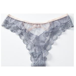 Tanga de encaje transparente sin costuras para mujer, de malla tejida, con estampado sólido, de talle bajo, talla 4XL - Product Image 5