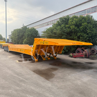 Semi-remorque à plateau surbaissé à 4 essieux de 100 tonnes pour le transport de gros équipements et de machines, semi-remorque à plateau surbaissé hydraulique pliable à usage intensif