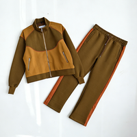 Conjunto de chándal para hombre con bloques de color, chaqueta con cuello alto y cremallera completa, pantalones acampanados, transpirable, estilo urbano vintage, OEM personalizado, venta al por mayor