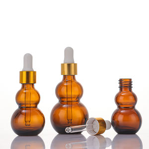 Fabrik preis Probe Kostenlos 10ml 20ml 30ml Doppel kürbis form Bernstein ätherisches Öl Glas Tropf flasche mit Gold Blumen korb kappe - Product Image 6