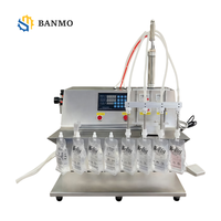 Machine de remplissage automatique à 4 buses en acier inoxydable avec pompe à engrenages pour jus, lait, eau potable, huile, sachets Doypack à bec verseur