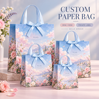 Sac en papier cadeau personnalisé avec poignée en ruban, motif floral bleu pastel, plusieurs tailles, impression personnalisée, emballage de marque